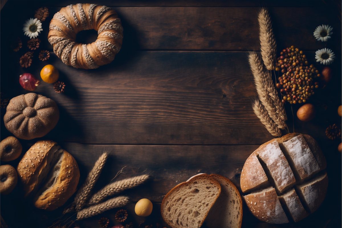 Hero image with baked pastry around a wooden table