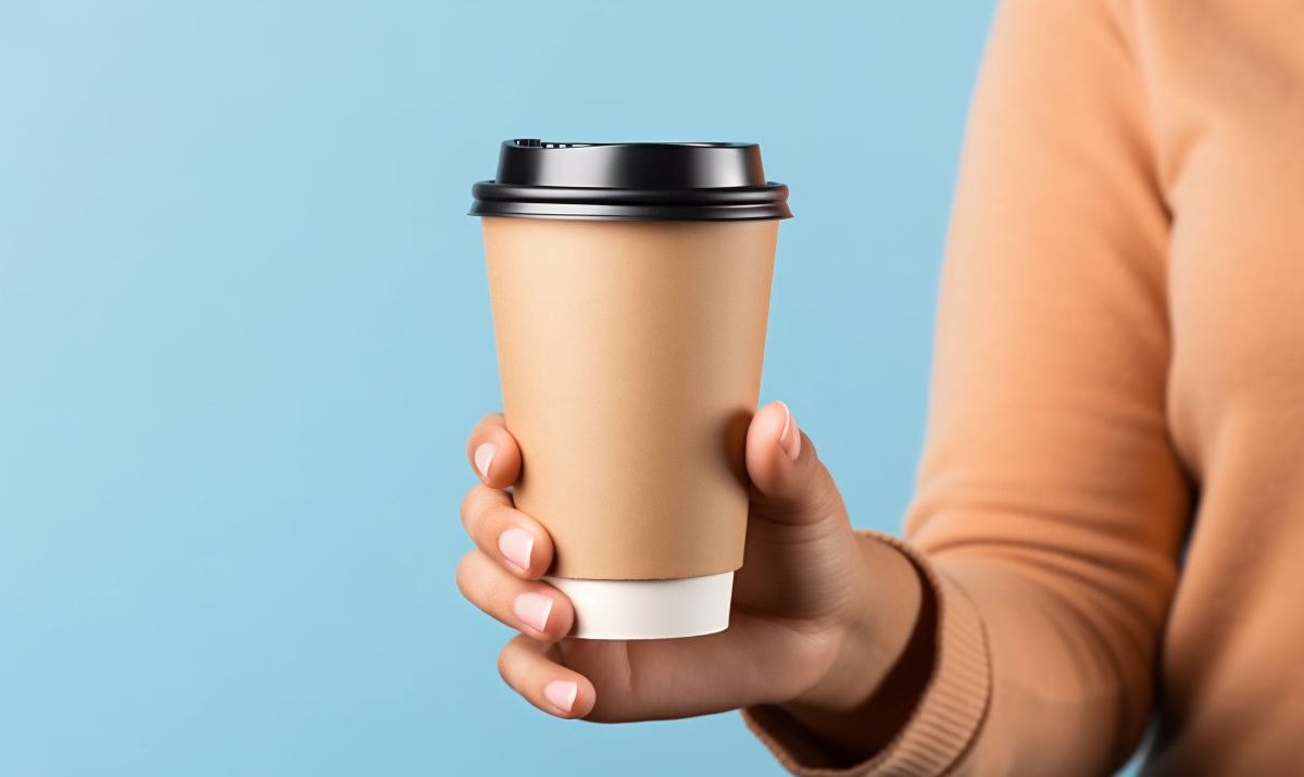 Holding paper cup mockup