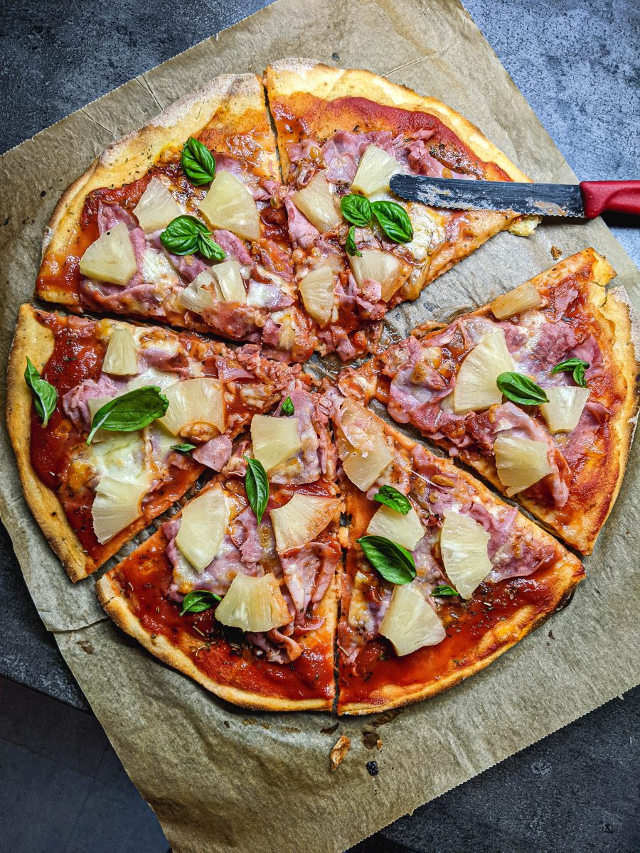 Pizza with pineapple and thin crust